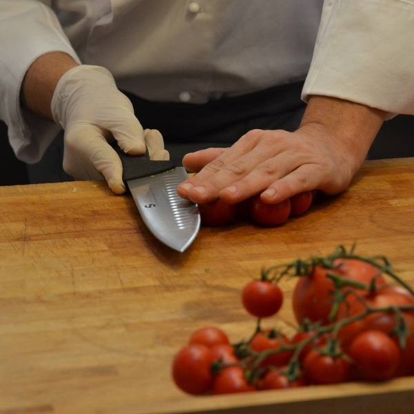 Why do chefs prefer wooden cutting boards