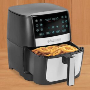 How To Use A Gourmia Air Fryer For The First Time | A Gourmia air fryer with a digital touch control panel displaying 400°F and 20 minutes, with a basket filled with crispy onion rings.