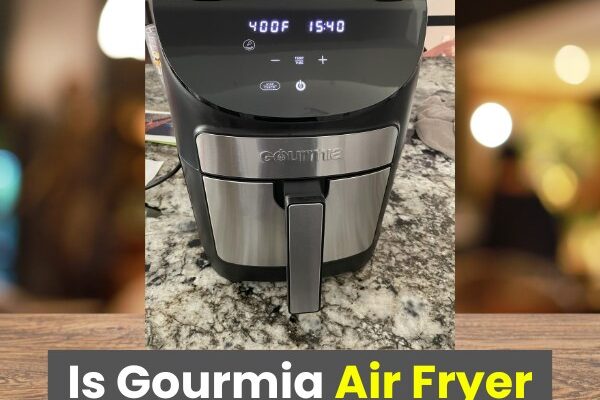 A Gourmia air fryer placed on a kitchen countertop with a digital display showing 400°F and 15:40, with the text overlay 'Is Gourmia Air Fryer Non-Toxic?' in bold white and yellow font. | Is Gourmia air fryer non toxic?